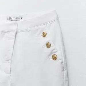 ★★ ★★ gold button straight pants T22E7WPC07 Gold Metallic Straight Pants – Adrienne's Boutique